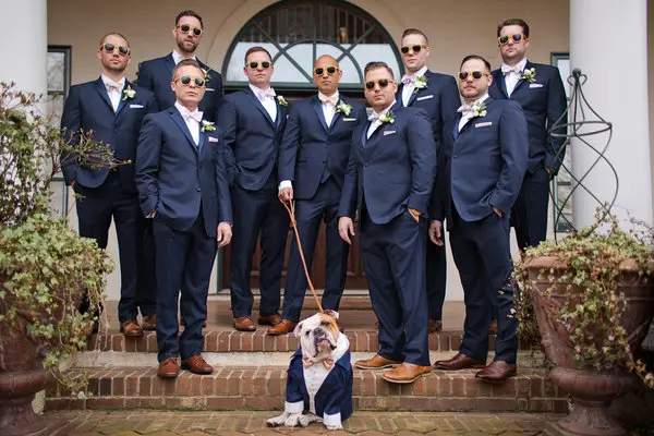 Groomsmen with a dog