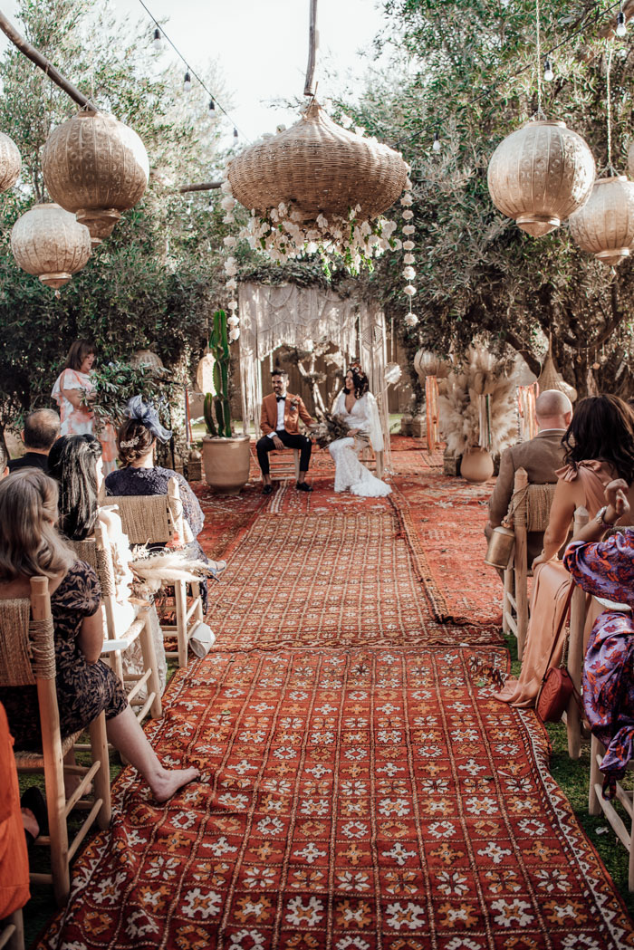 Wedding altar with guests sitting in chairs